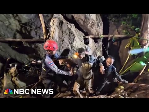 Trapped survivor rescued from cave in Laos