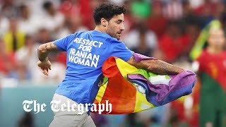 Rainbow-flag waving protester brings World Cup Portugal vs Uruguay match to a halt