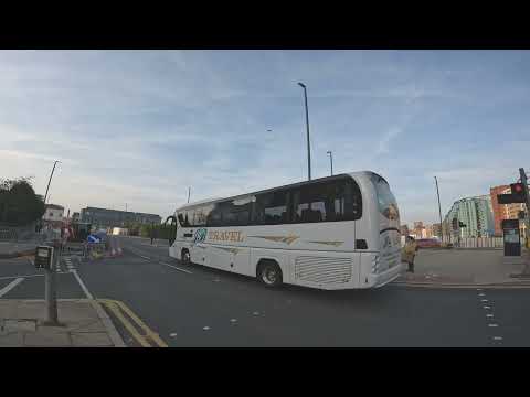 J&B Travel, Leeds. Driver of OU15 ZWV Mobile Phone User.