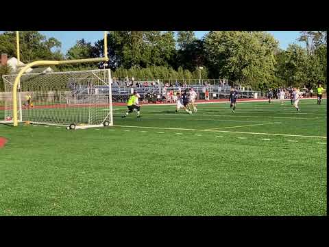 Gabe Toledo of Chatham is tripped, drawing the penalty kick