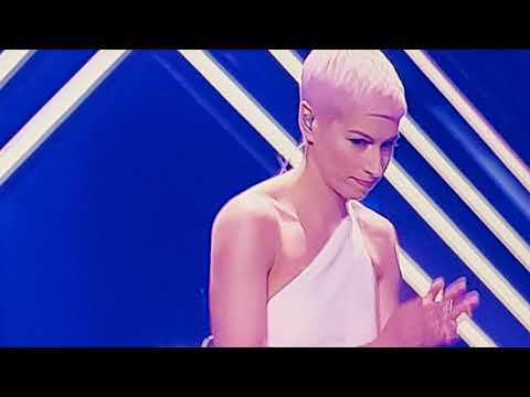 #Eurovision 2018 A man storms the stage during UK's SuRie song #Brexit