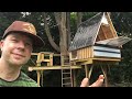 A frame tree house with flip-open wall (and a cool zip line!)