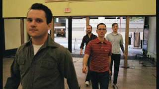 New Amsterdams - Watch The World Cave In