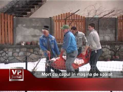 Mort cu capul în maşina de spălat