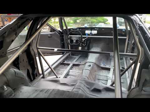 Foxbody Team Z 8.50 Roll Cage and through the floor sub-frame connectors.