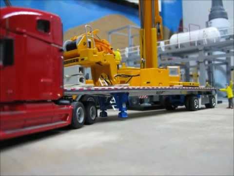 LIEBHERR LTM 1300/1 lifting a 50 ton vessel.