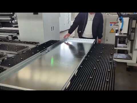 Metal bending machine.Automated sheet metal forming equipment.The bending machine is working