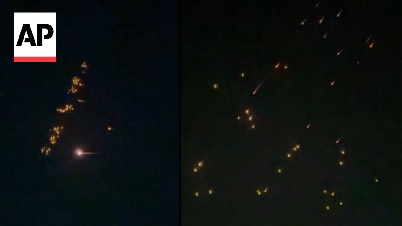 Video | AP video shows apparent Iran ballistic missiles dropping smaller bomblets