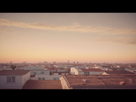 Sunrise Over Quiet Rooftops