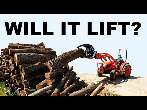 KIOTI tractor moving OAK and HICKORY logs