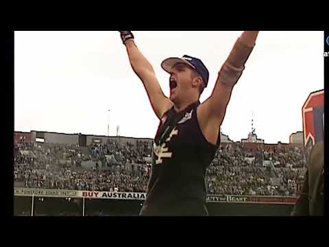 Peter Dean’s famous fall while collecting his premiership medal in the 1995 AFL Grand Final