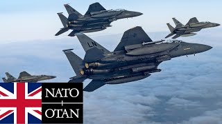 NATO, UK. US Air Force F-15 fighter jets at low altitude during Exercise Point Blank.