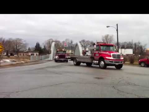 Video Part 2: Tow trucks lead funeral procession