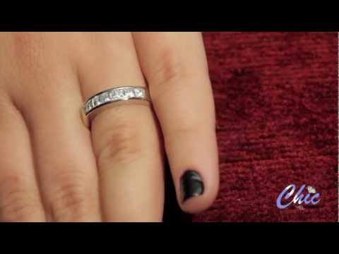 Classy wedding band, with AAA high quality 7 princess cut stones set in channel setting. Item #P8150