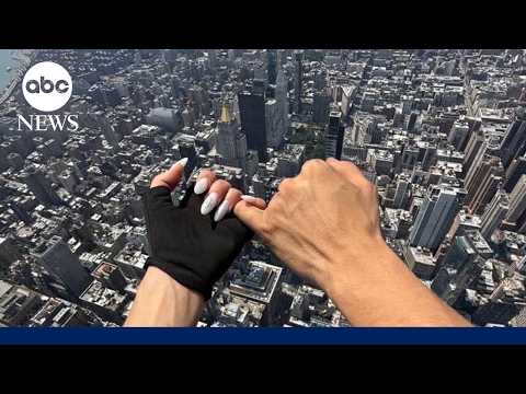 Daredevils Climb To Top Of The Empire State Building, Display Banner Before Proposal