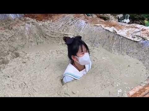 girl sink in clay quicksand