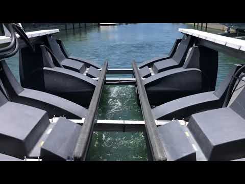 Moving a Harbor Hoist Floating Boat Lift with a Barge