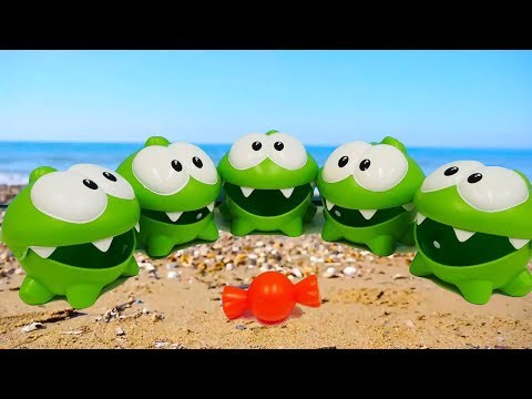 Om Nom toys & toy cars on the beach. Toy videos for kids.