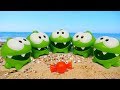 Om Nom toys & toy cars on the beach. Toy videos for kids.