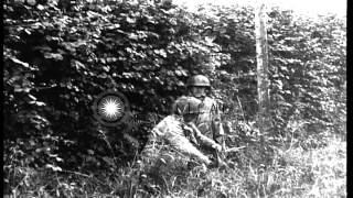 Military vehicles on a street at St Lo in Normandy, France. HD Stock Footage