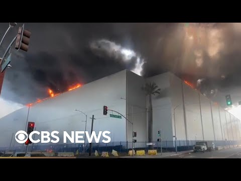 Massive warehouse fire in California is still blazing six days after inferno began
