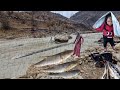 Nomadic Mother Fishing In Heavy Rain With Her Children Survival In The Zagros Mountains