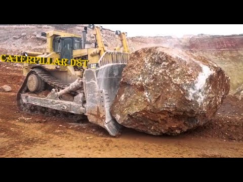 Caterpillar D8T Dozer Pushes 100-ton Boulders