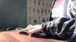 spinning cotton candy in a shack made of shingles