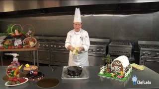 Learn how to make and professionally decorate chocolate flourless cake