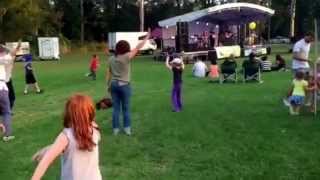 Kids dancing to Sons of Korah at Moofest