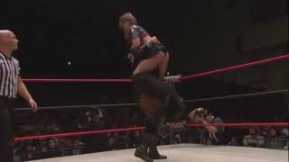 Wrestling women getting bearhugged