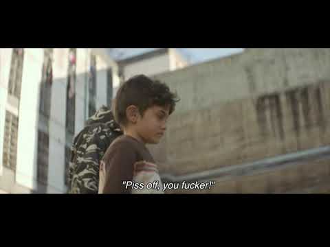 Scene from "Capernaum" movie where Zain makes a telephone call to the TV station from prison.