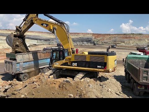 Caterpillar 385C Excavator Loading Mercedes & MAN Trucks - Interkat SA