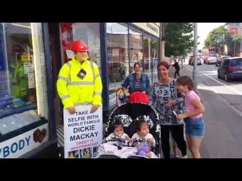 mannequin-man performming as a Mechanical Mannequin: Taking the place of Dickie Mackay, the mannequin that has been standing outside Mackays of Cambridge for years. Passers-by got a shock when taking a selfie with the mannequin, when he suddenly comes to life.
In this one a family get a real shock as Dickie the mannequin moves. for Mackays on 23/08/2014