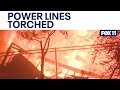 Palisades Fire burns through power lines in California.mp4