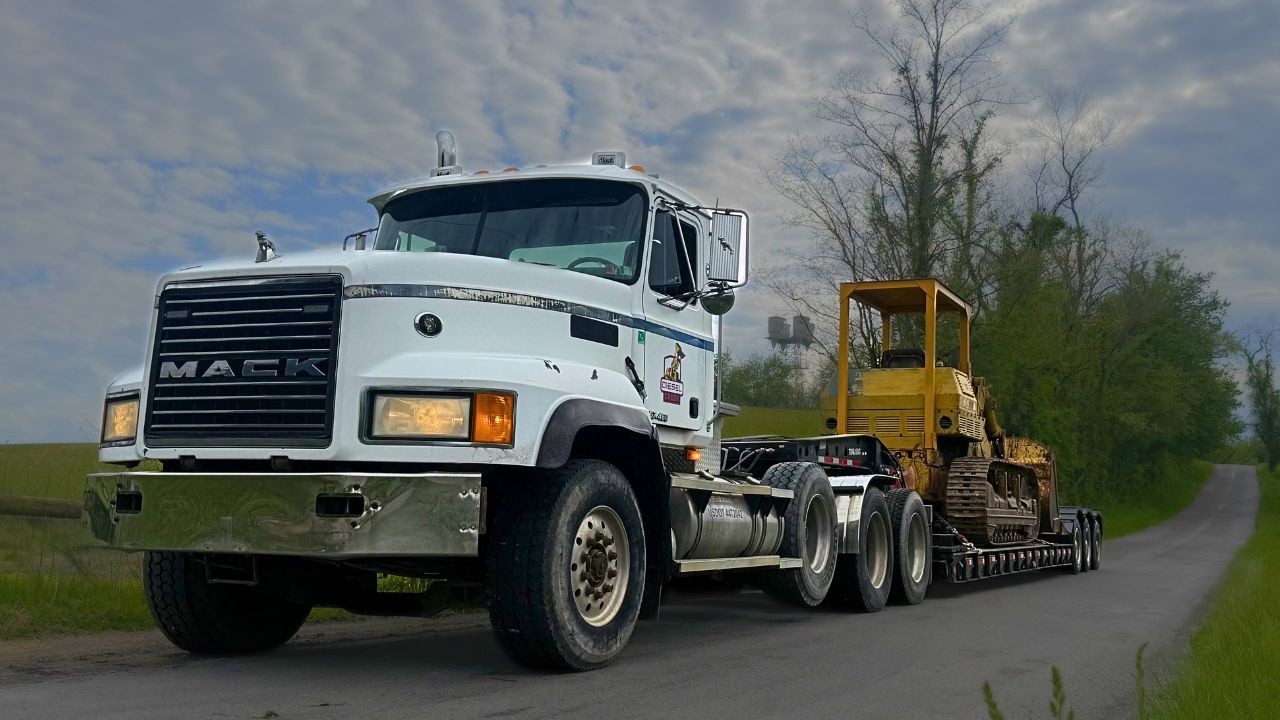 BACK ON THE ROAD! $12,000 Auction Mack Hauls Again! (CAT 977 Comes Home)