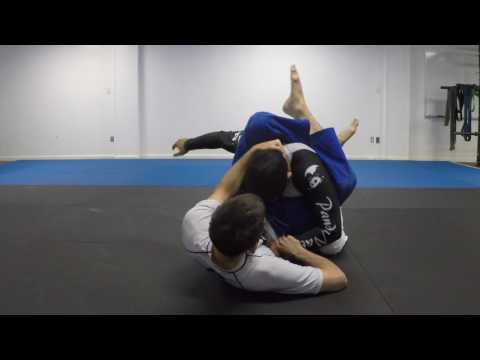 Breaking wrist grips when in closed guard (no-gi)