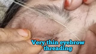Very thin eyebrow threading