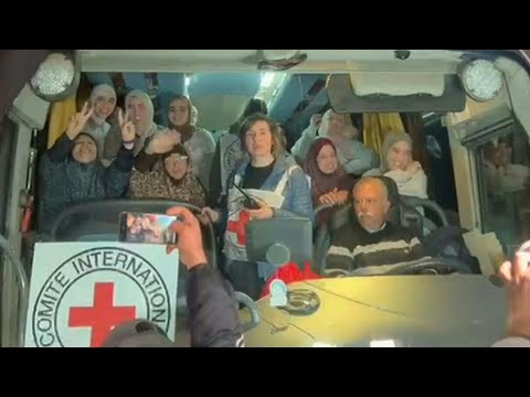 Crowds cheer as freed Palestinian prisoners arrive in West Bank town | AFP