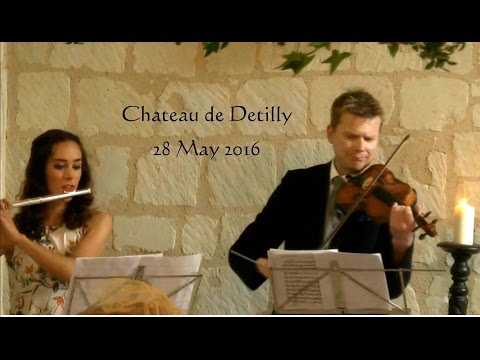 Flute and violin play Pachelbel's Canon for bride's entry.