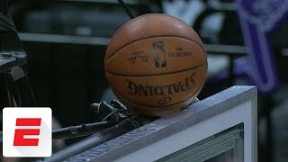 Ball somehow gets stuck on top of basket, and Buddy Hield comes to rescue with the mop | ESPN