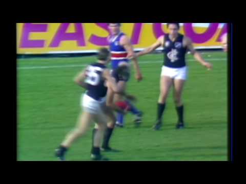 Simon Beasley super nice guy giving Doull headband back 1984 round 21