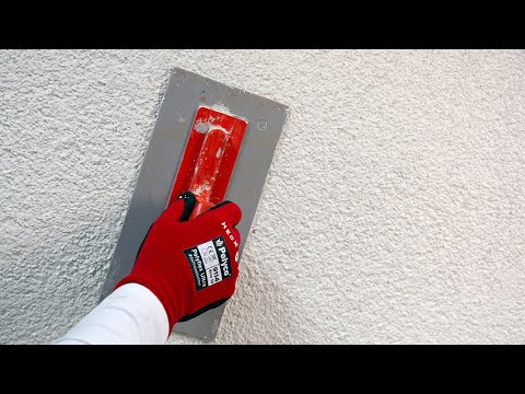 Mineralischen, dünnschichtigen Oberputz auftragen; Wand bzw. WDVS (Wärmedämmverbundsystem) verputzen