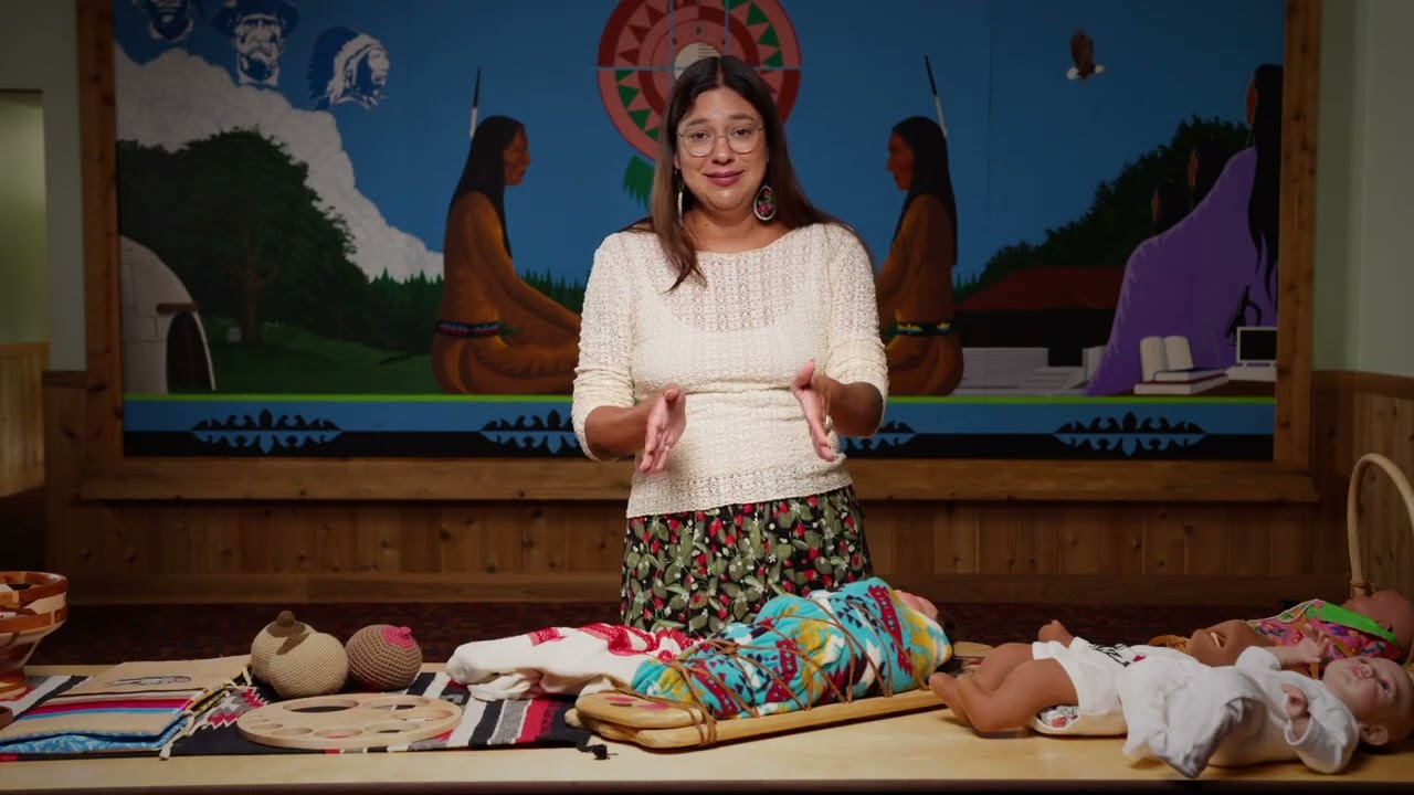 When should an infant start using a cradleboard