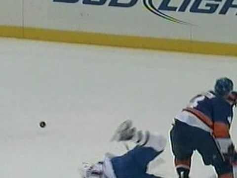 Mark Eaton hipchecks Scott Gomez