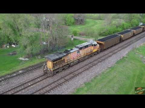 UNION PACIFIC CLINTON SUB customers in Tama, Ia. Three trains at Clinton Sub MP122 with drone views!