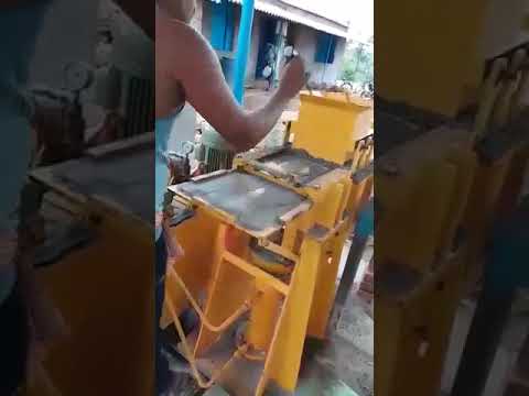 Hydraulic small fly ash brick machine