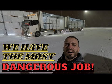 Winter trucking, loading LUMBER on a Scania 24m