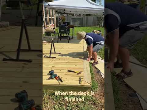 16x24 wood deck install last piece 2x6 on ground level with Simpson connections under deck