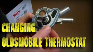 How to replace a Thermostat - Olds Intrigue